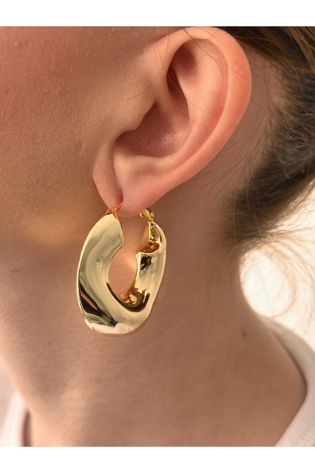 Çelik asimetrik halka küpe