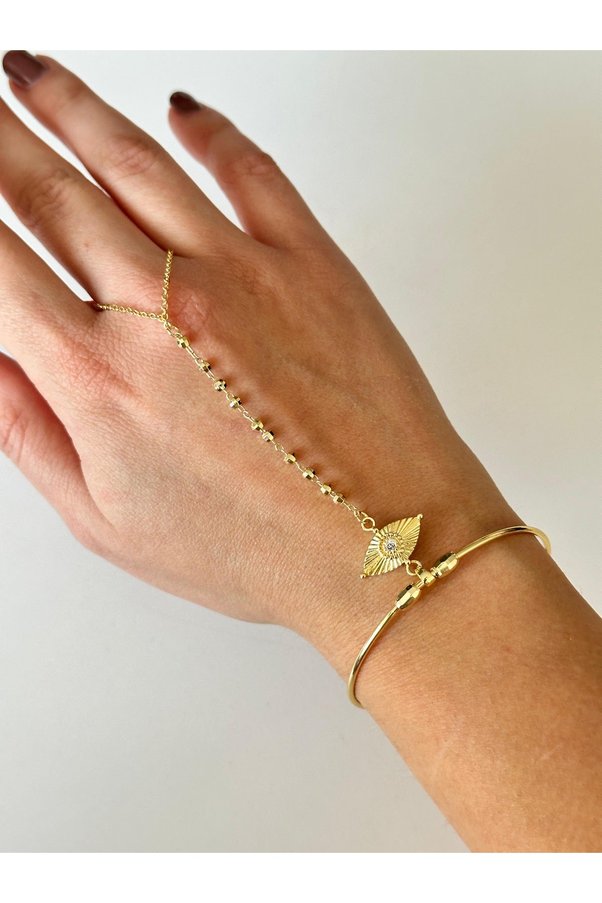 Çelik göz detaylı Şahmeran bileklik