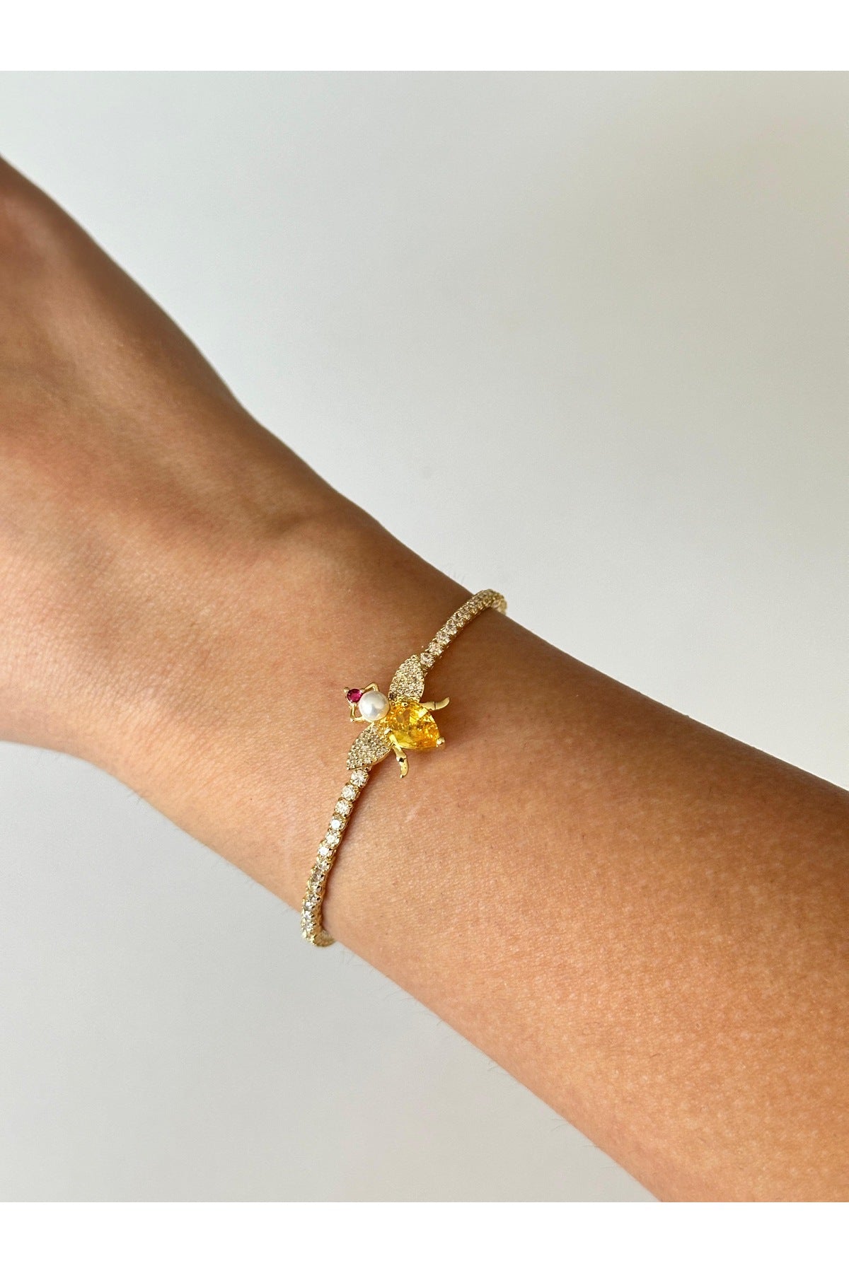 Çelik zirkon taşlı arı lastik bileklik