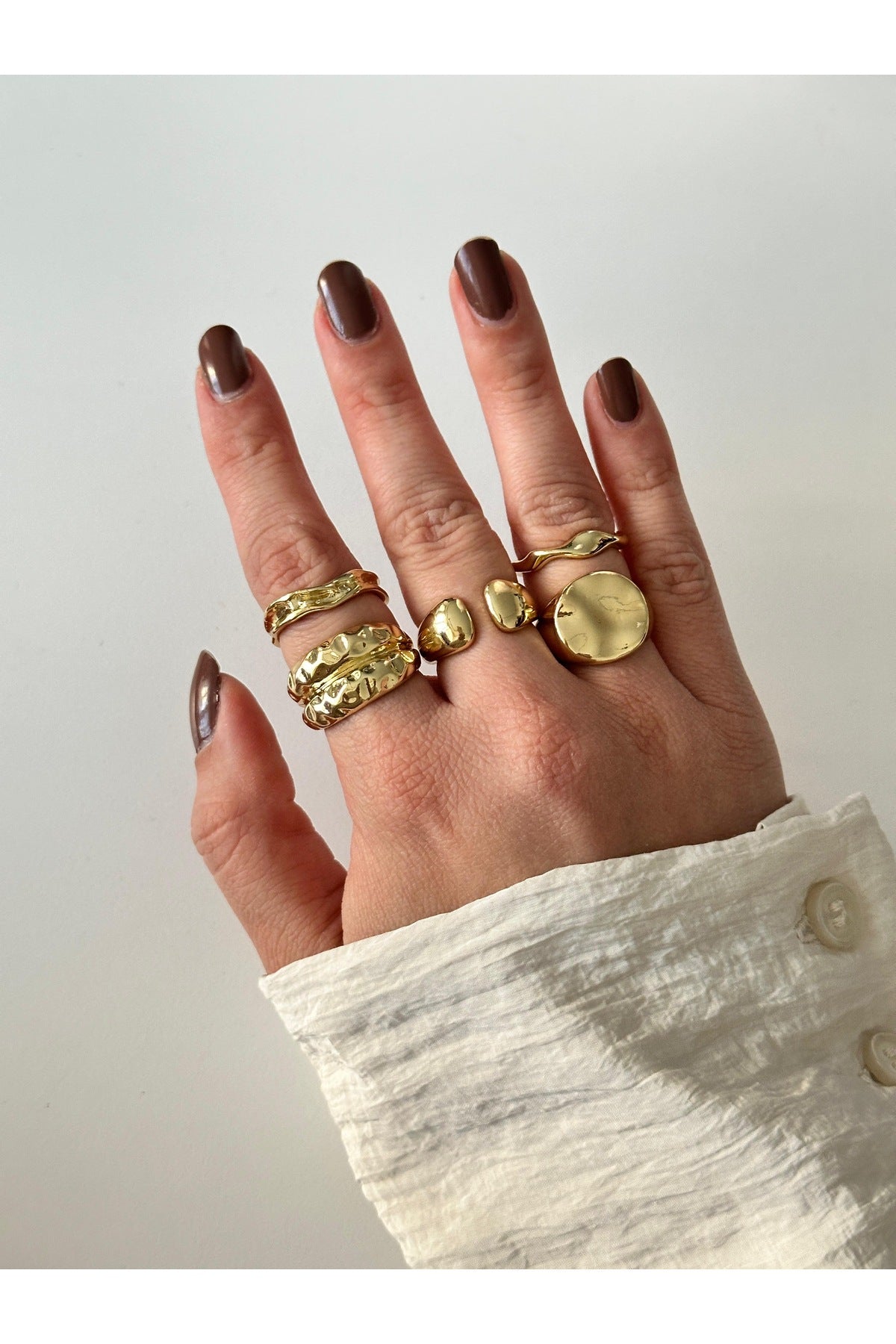 Çelik üzeri altın kaplama çoklu set yüzük