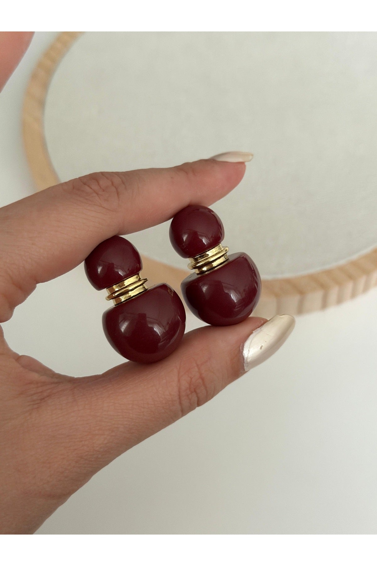 Çelik gold detaylı tofy bordo küpe