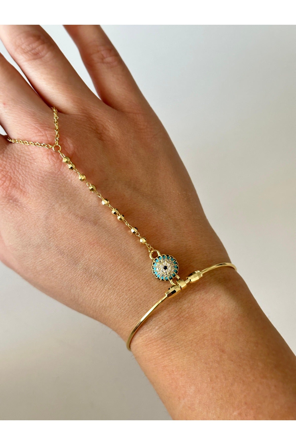 Çelik nazar boncuk detaylı Şahmeran bileklik