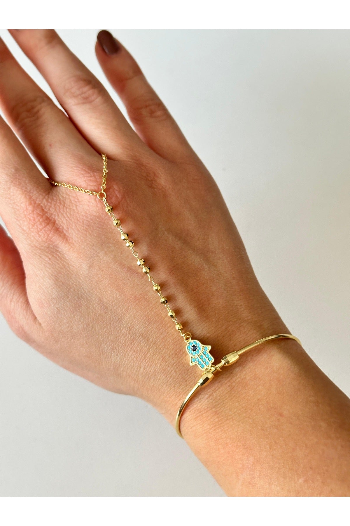 Çelik el detaylı Şahmeran bileklik