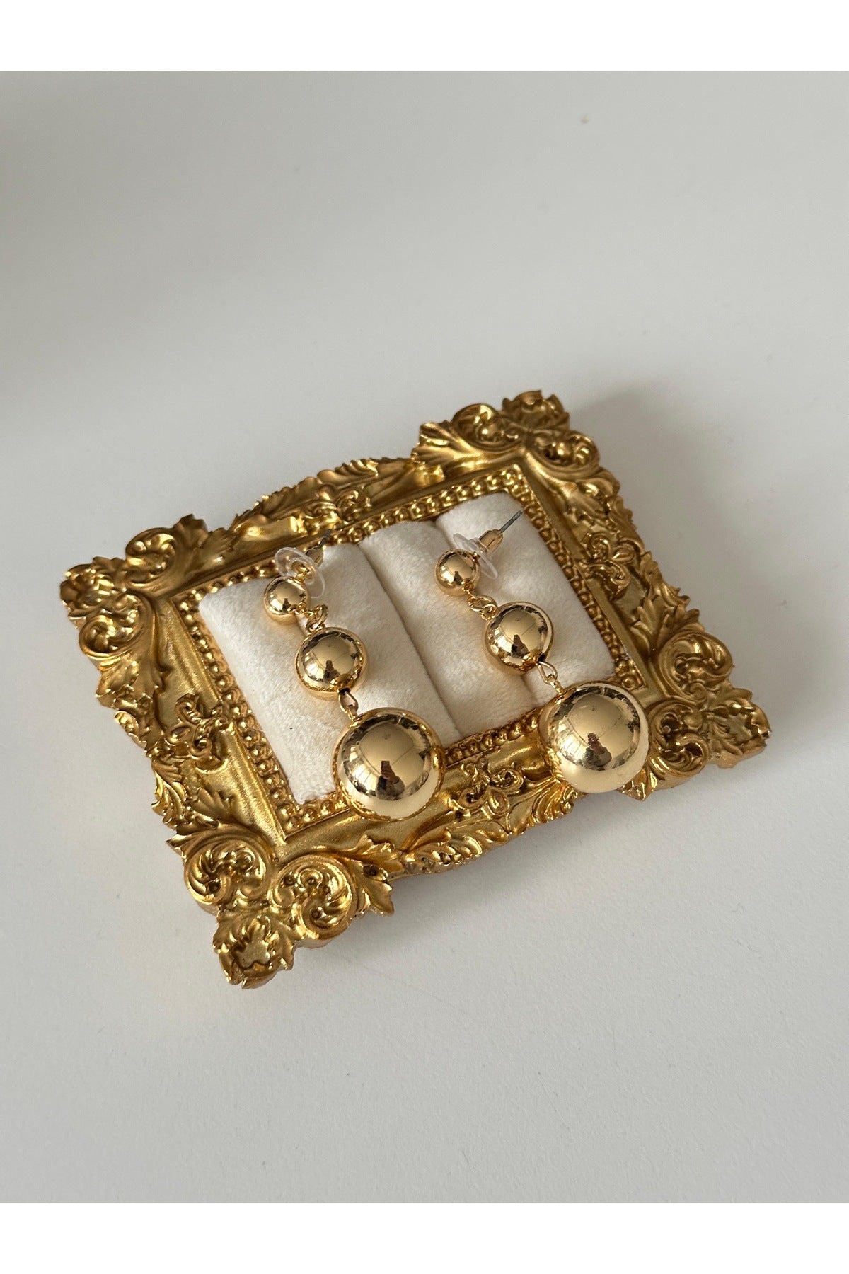 Çelik gold trie küpe