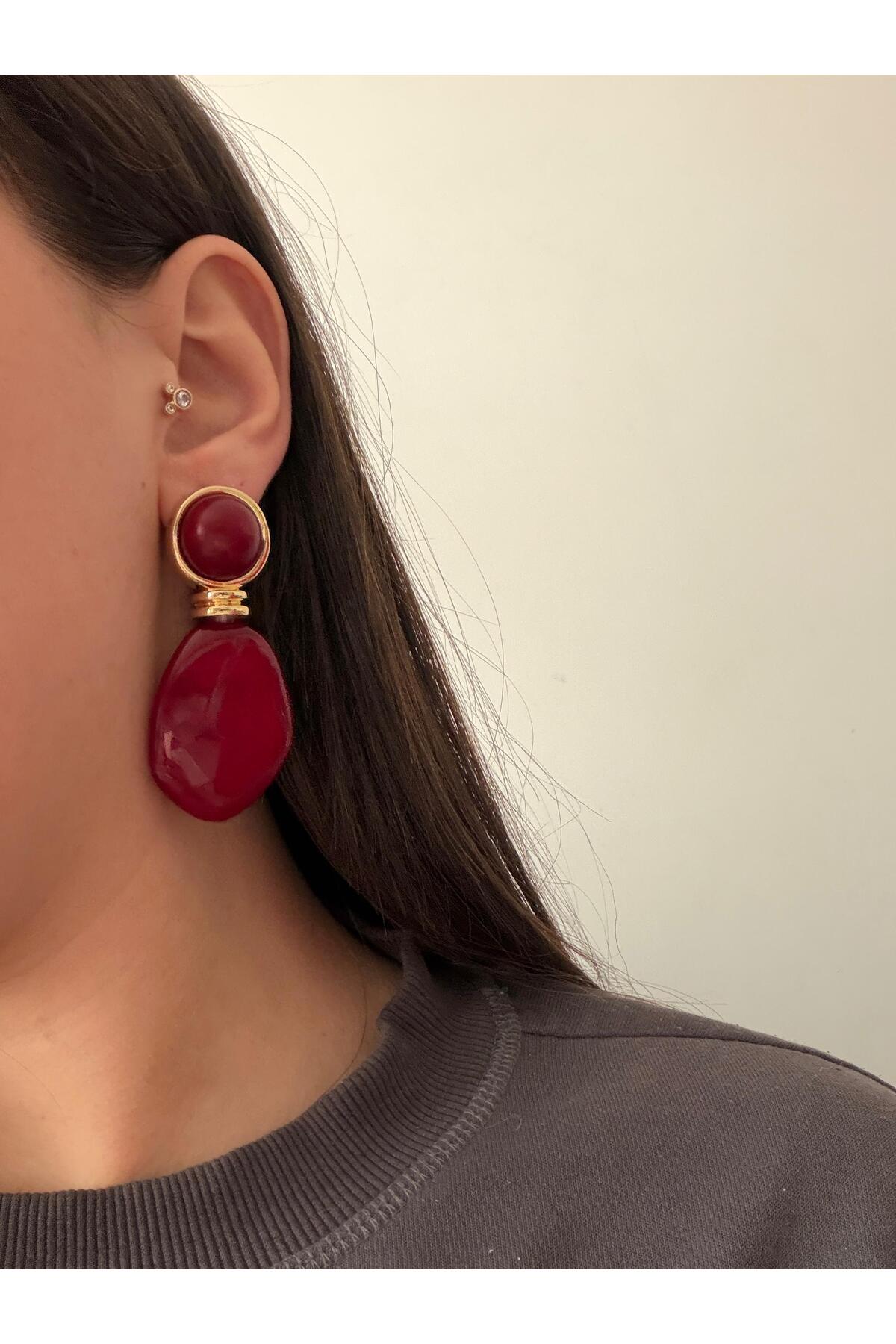 Çelik gold detaylı kemik bordo küpe