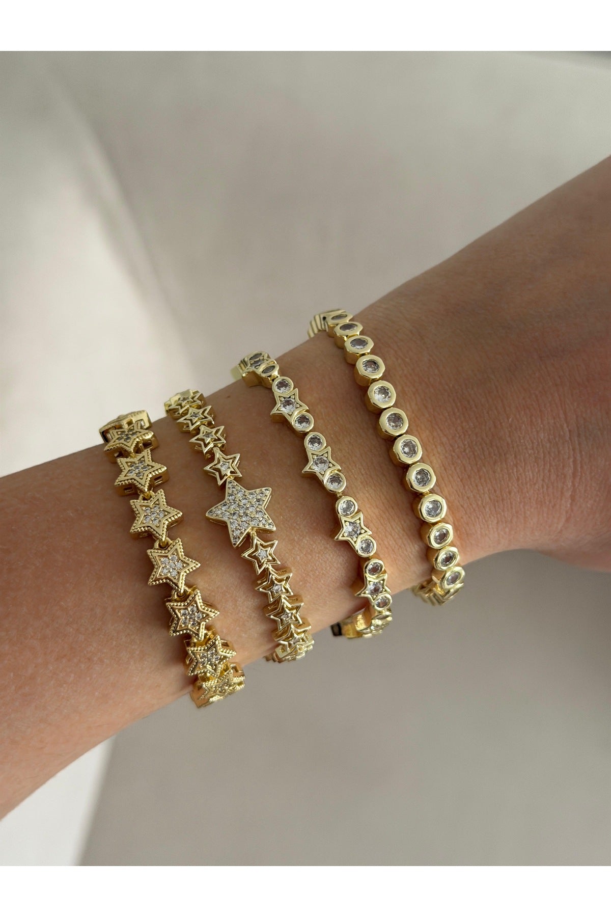 Çelik üzeri altın kaplama 4’lü bileklik set